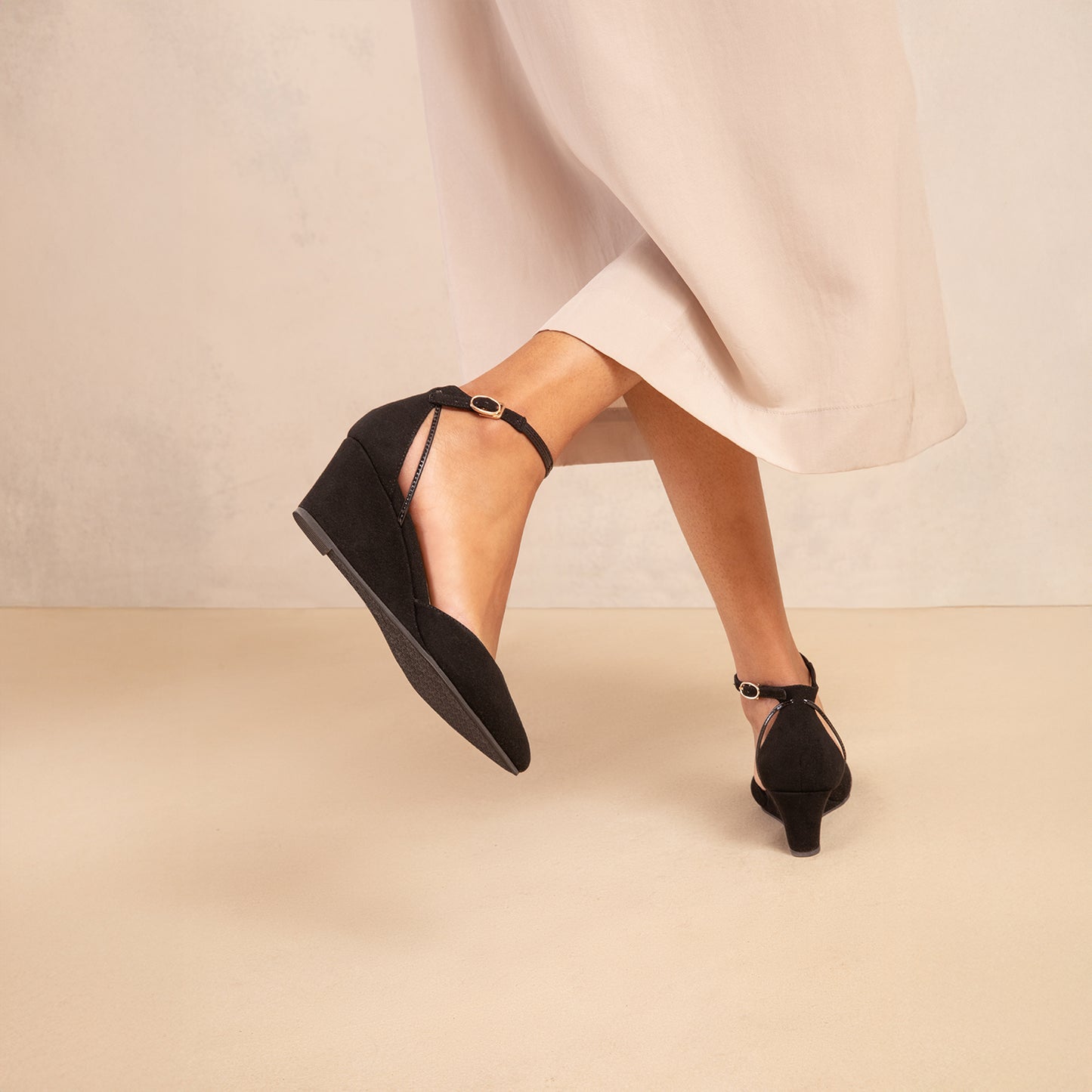 Black suede wedge shoes